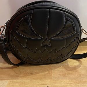 Love pain and stitched pumpkin purse